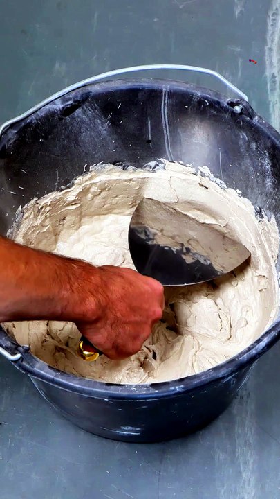 Watch the magic of a putty knife in action! 🏡