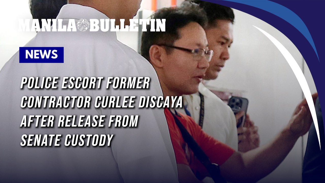 Police escort former contractor Curlee Discaya after release from Senate custody