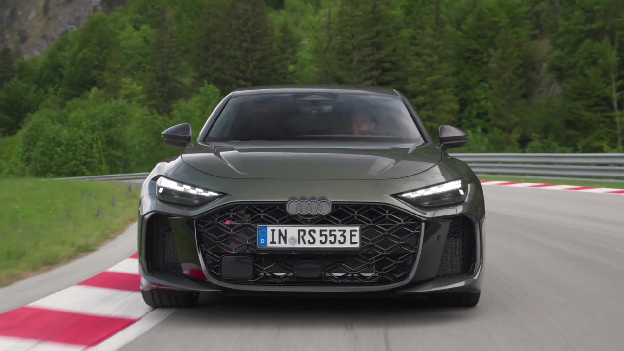 The new Audi RS 5 Sedan in Bedford green Track Driving