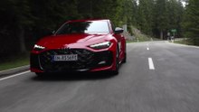 The new Audi RS 5 Sedan in Progressive red Driving Video