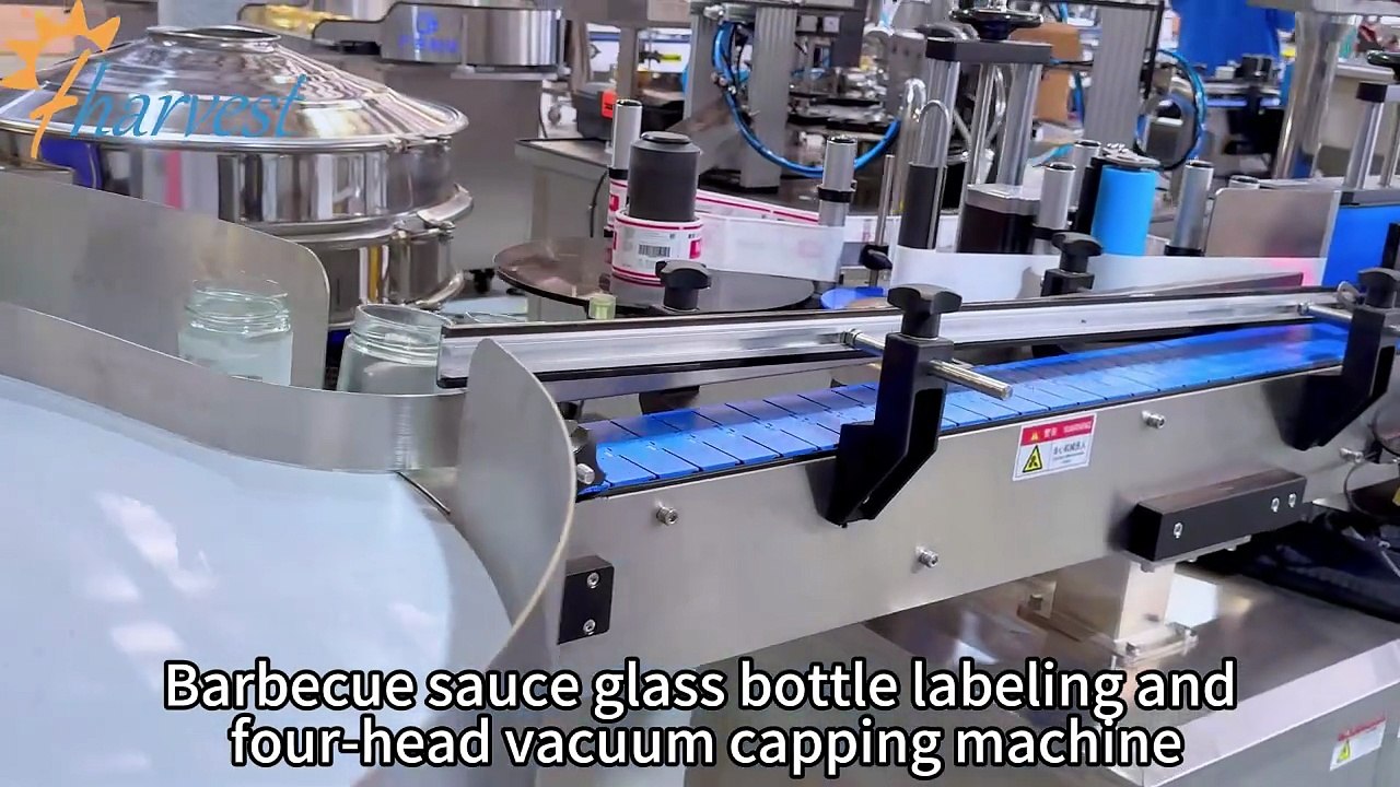 We manufacture chili sauce and need a production line that includes a glass bottle labeling machine and a four-head vacuum capping machine.