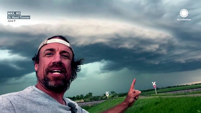 Tornado potential ramps up as storm chasers track a line of supercells in North Dakota