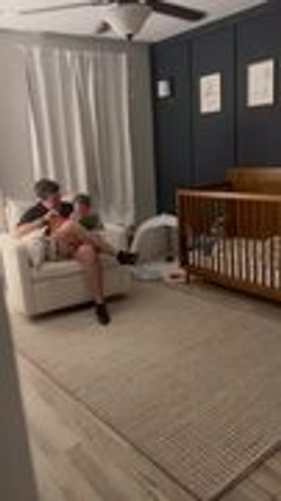 Toddler Laughs Heartily as Dad Tries to Read Spanish Bedtime Books