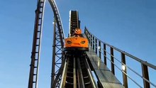 riding the roller coaster with a jack o lantern on my head