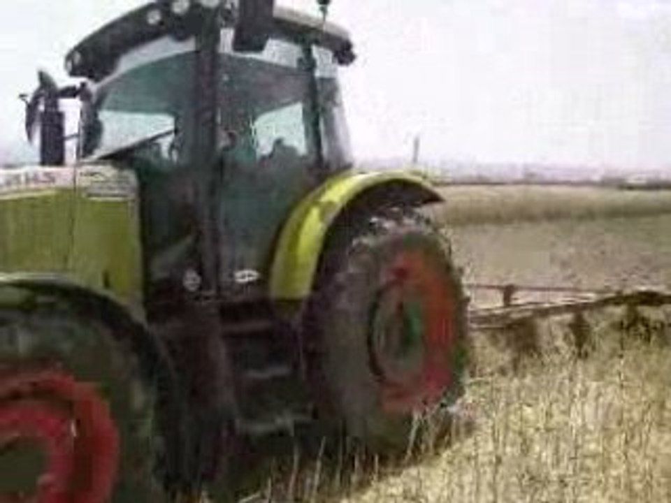 CLAAS ARES 567 ATX PLOUGHING THE CANOLA FIELD 2008 PART1