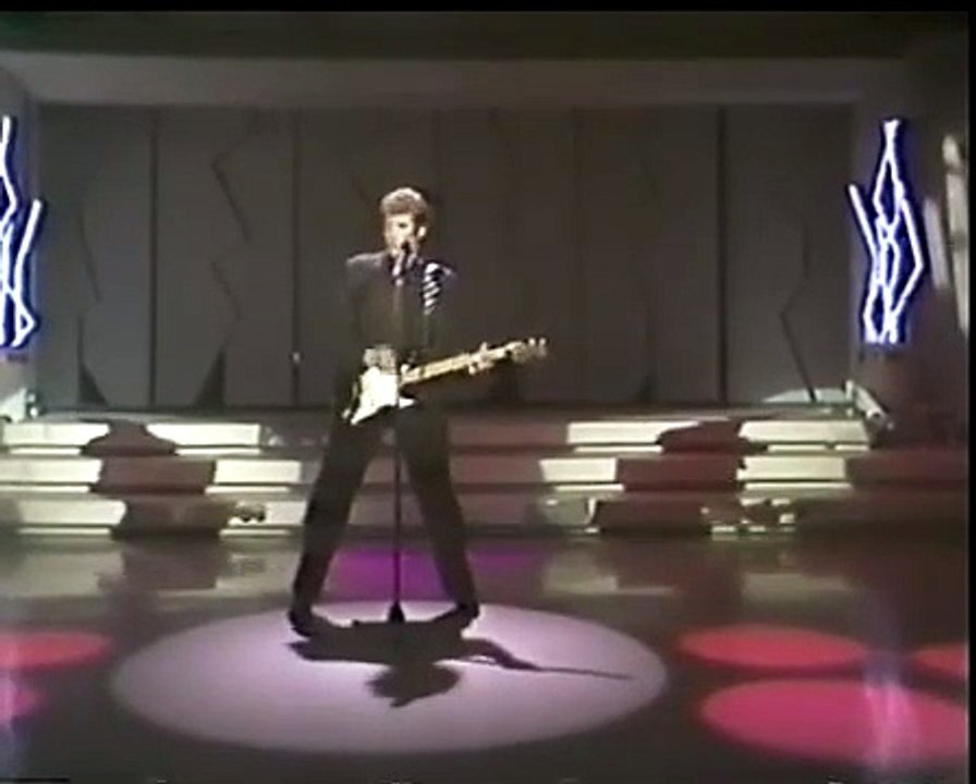 1985 - Johnny Hallyday - “Pendue à Mon Cou” dans “Variétés Michel Jasmin” (Radio-Québec, 15 Avril)