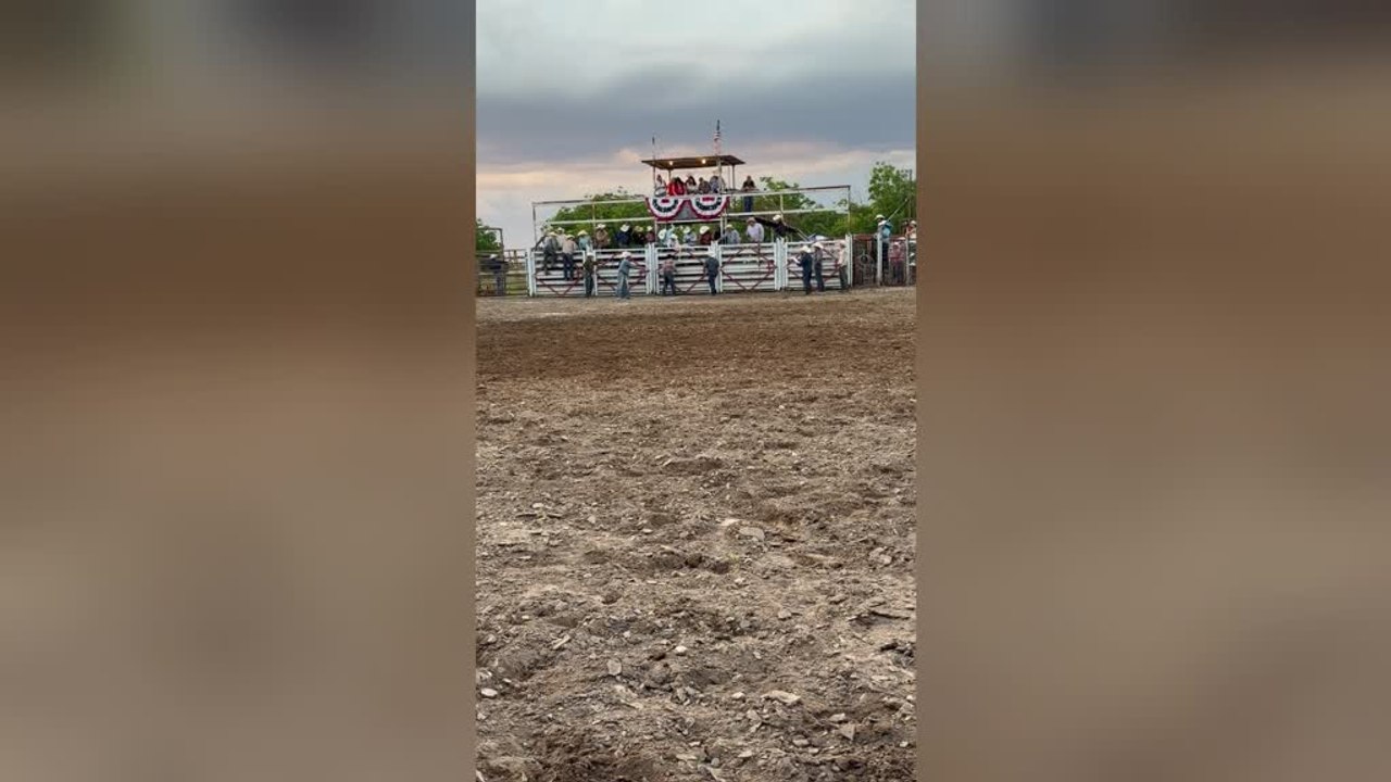 Cowboy Stays in the Saddle as Horse Flips Over During Ranch Rodeo
