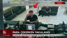Antalya'da dolandırıcılık şüphelisi bankada para çekerken yakalandı
