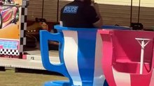 Heartwarming Moment: Officer Enjoys Teacups While Eating Ice Cream