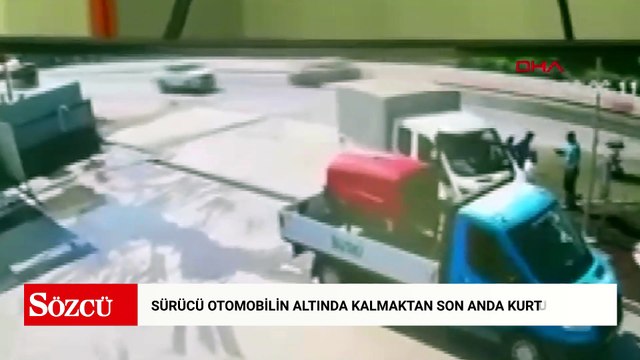 Devrilen motosikletin sürücüsü otomobilin altında kalmaktan son anda kurtuldu