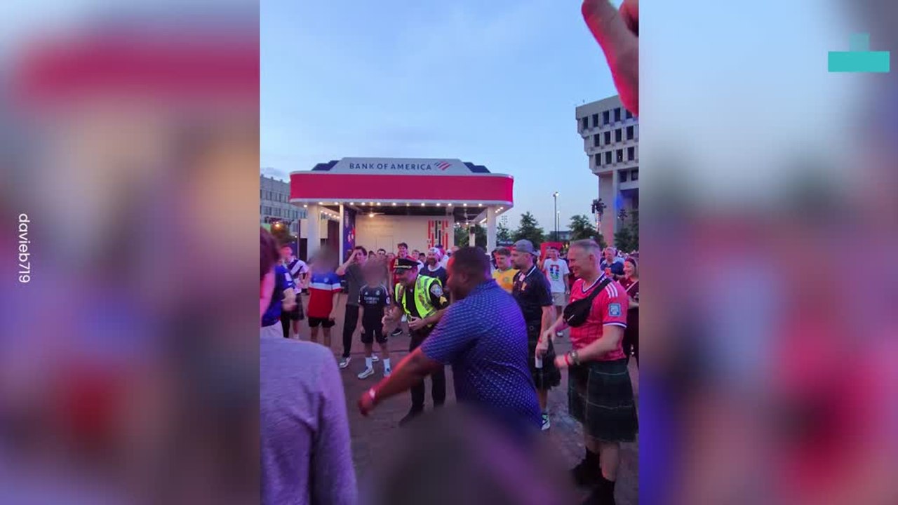 Usa Cop Celebrates Scotland's Arrival to the World Cup