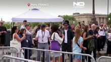 França: multidões acorrem à instalação gigante de JR na Pont Neuf