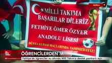 Fethiye'de öğrenciler su altında Milli Takım'a destek pankartı açtı