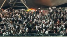 Legia Warszawa Fans Light Flares And Set Part Of Stadium Stand On Fire