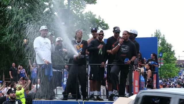 Champagne sprays as Knicks celebrate title at championship parade