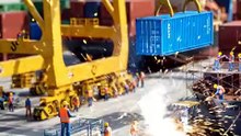 Miniature_workers_constructing_K…_202606181516