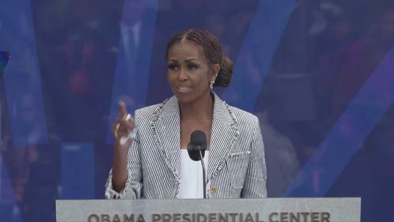 Hillary Clinton howls with laughter as Michelle Obama trolls Trump during heartfelt speech to husband Barack