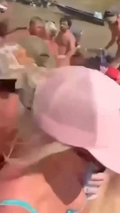 Massive brawl on river sandbar