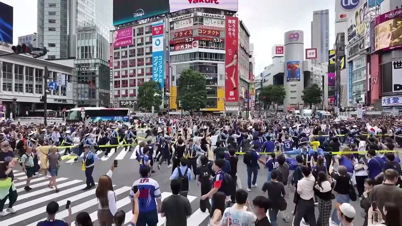 Ecstatic Japan fans take over Tokyo's Shibuya Crossing after 4-0 win over Tunisia
