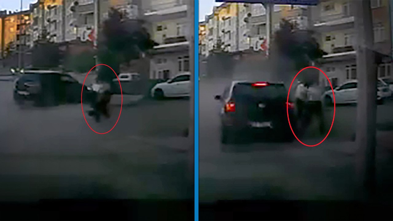 Otomobilin altında kalmaktan son anda kurtuldular; o anlar kamerada