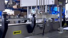 Who manufactures an automatic plastic can sealer with good sealing precision for dry goods?