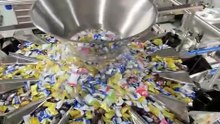 Who supplies a combination weighing filler for candies with accurate multi-head weighing？
