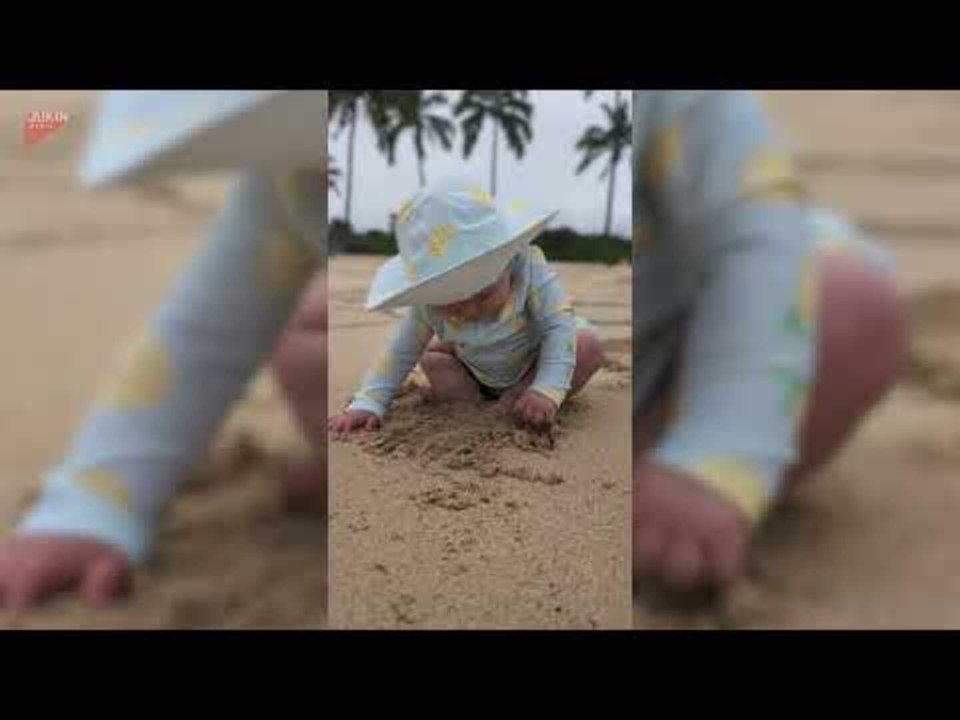 Toddler Plays in Sand