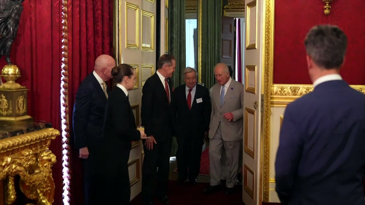 King Charles meets Ed Miliband at climate reception