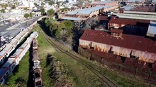 LA DESTRUCCION DE LOS TRENES DE LARGA DISTANCIA.  ( grandes talleres  desde el aires)