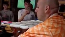 Dutch fan stuns pub by carrying 26 beers at onc