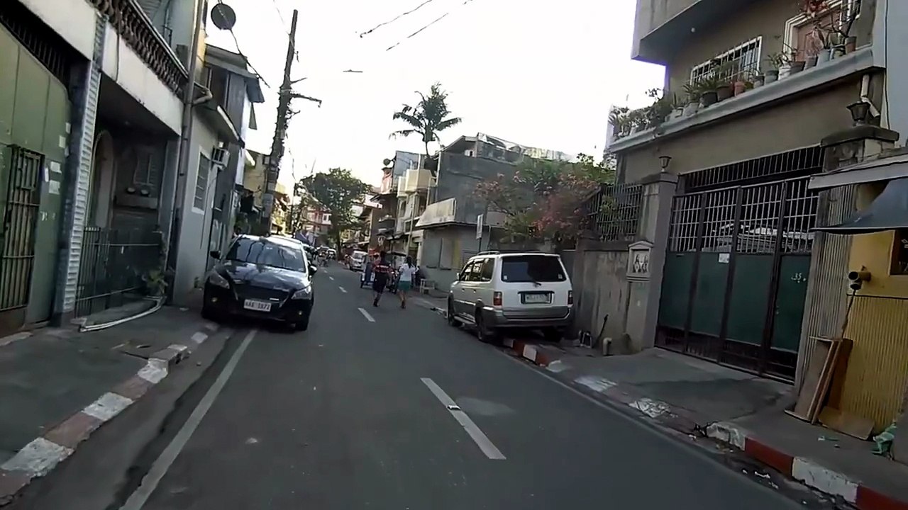 Fine Day on San Perfecto Street in San Juan City in the Philippines