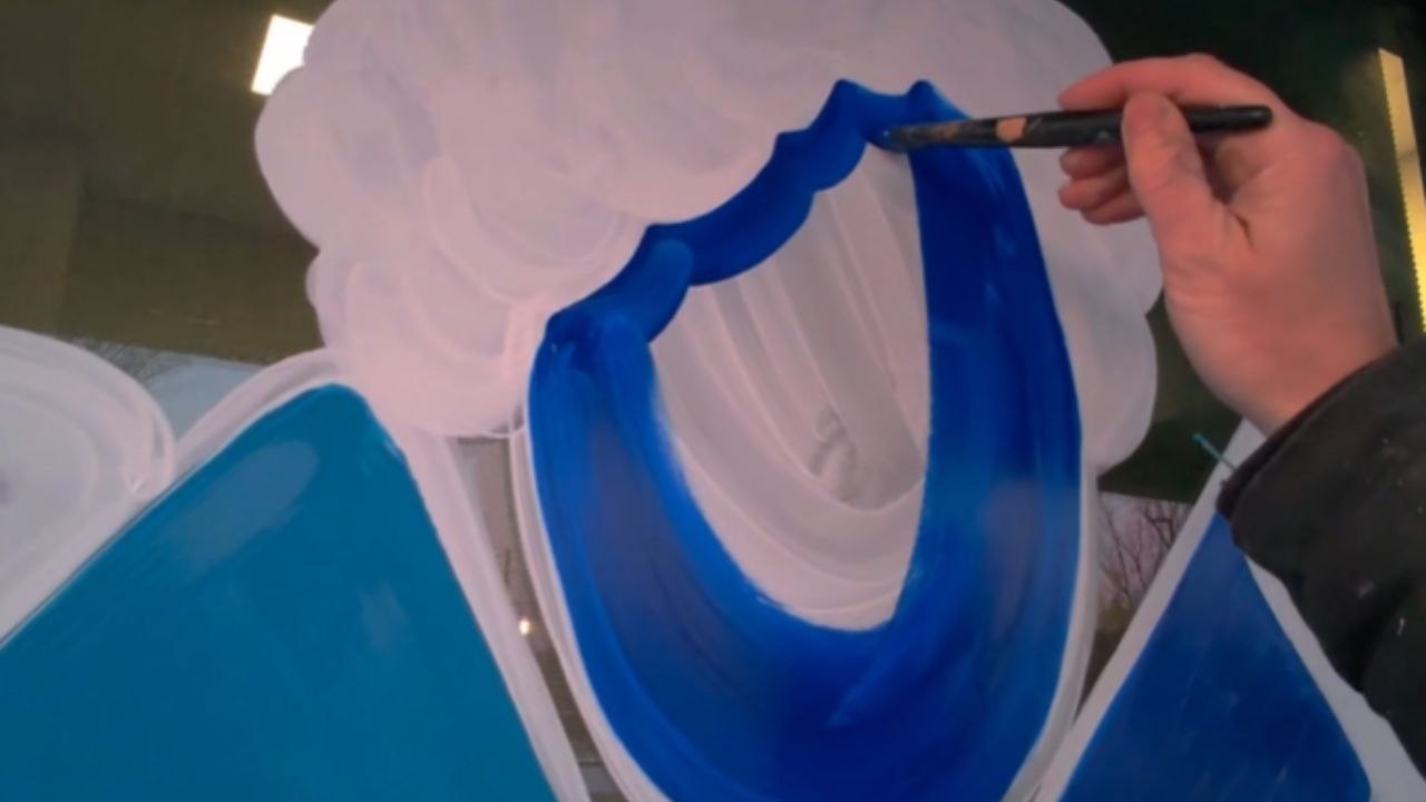 Talented Artist Creates Eye Catching Artwork For Business Exterior