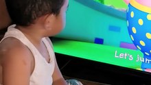 Isaiah watching on TV