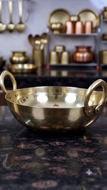 Woman_showing_brass_pot_202606301045