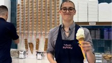 Server Scoops Whipped Cream Off A Cone And Tosses It At The Owner