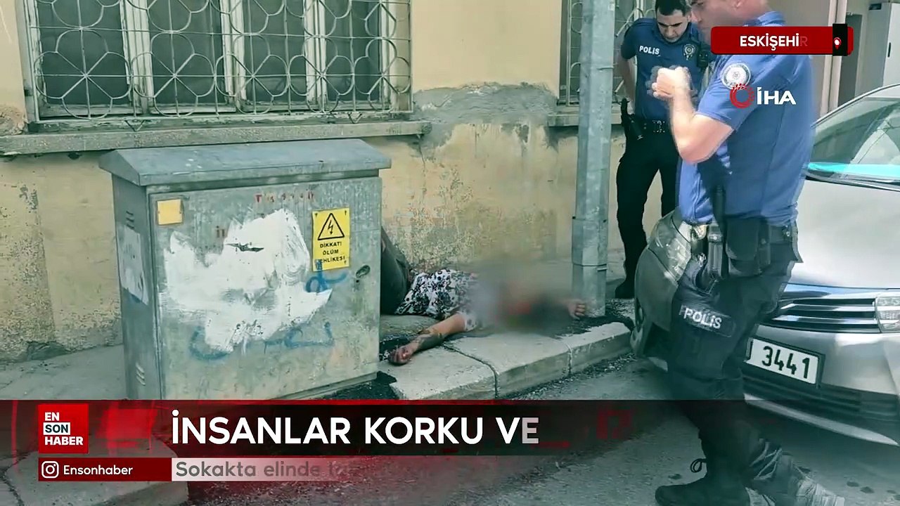 Eskişehir'de sokakta elinde tabancayla hareketsiz yatan genç paniğe neden oldu