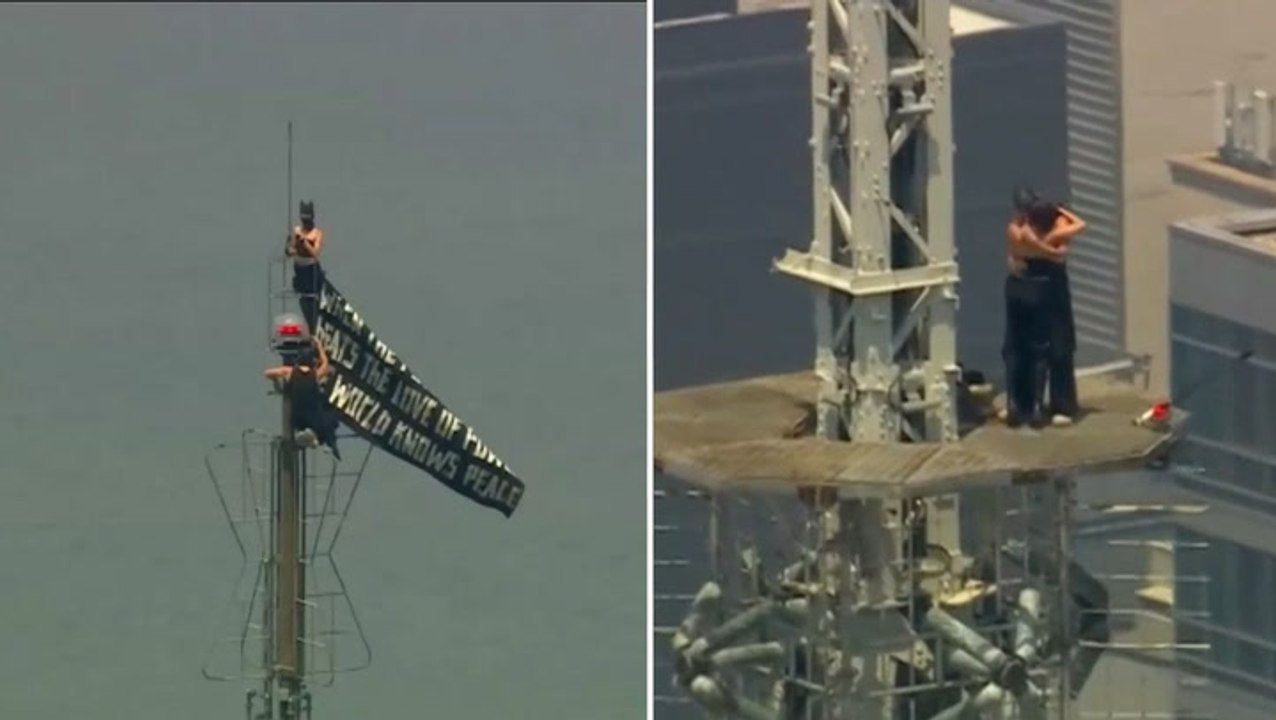 Watch: Masked Empire State Building pair appear...