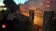 Aksaray'da çocukların su bidonlarıyla yangına müdahalesi kamerada