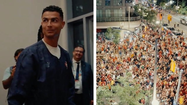 Cristiano Ronaldo celebrates with fans outside Toronto hotel after World Cup win