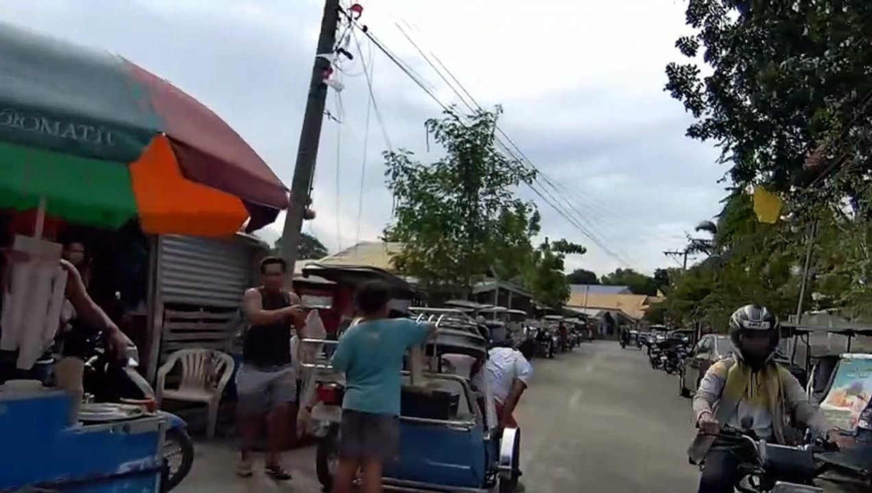 Lined Tricycles on San Miguel Road in Calasiao, Pangasinan, Philippines
