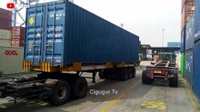 Wan Hai Lines import container unloading operations at Tanjung Priok Port.