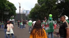 Mexican and English fans mingle in capital ahead of World Cup knockout match