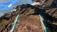 Modern cliffside home with a glass-bottom pool over the ocean