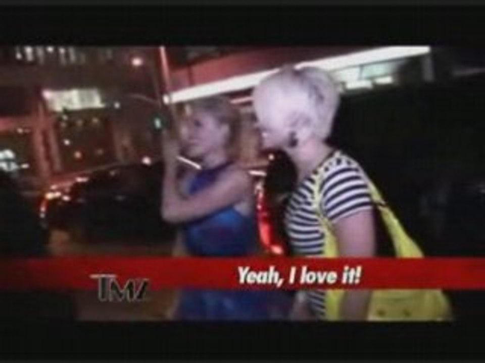 Kimberly and Ashley talking to a fan