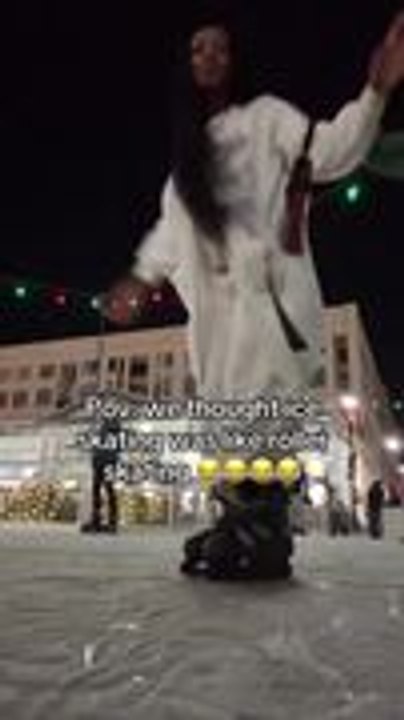 Two Women Fall While Ice Skating Together
