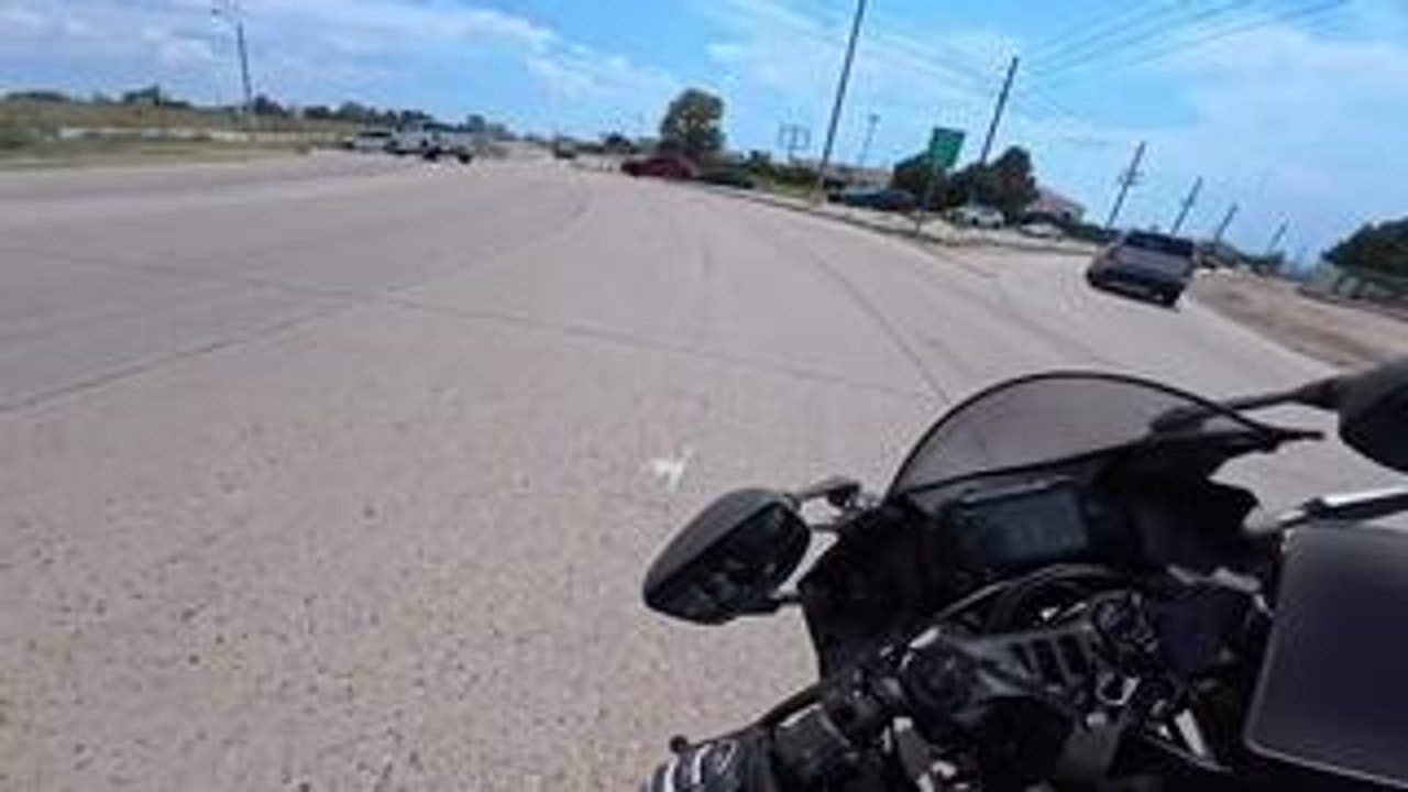 Car's Sudden Stop Causes Motorcycle Accident