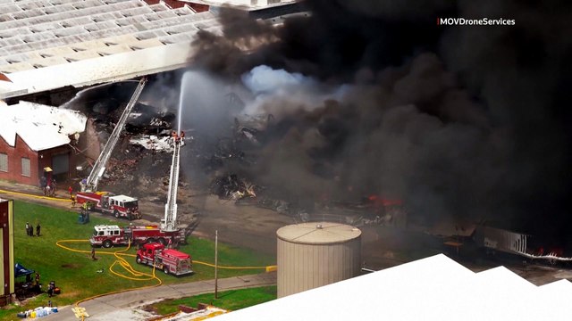 Thick smoke billows from warehouse fire in West Virginia