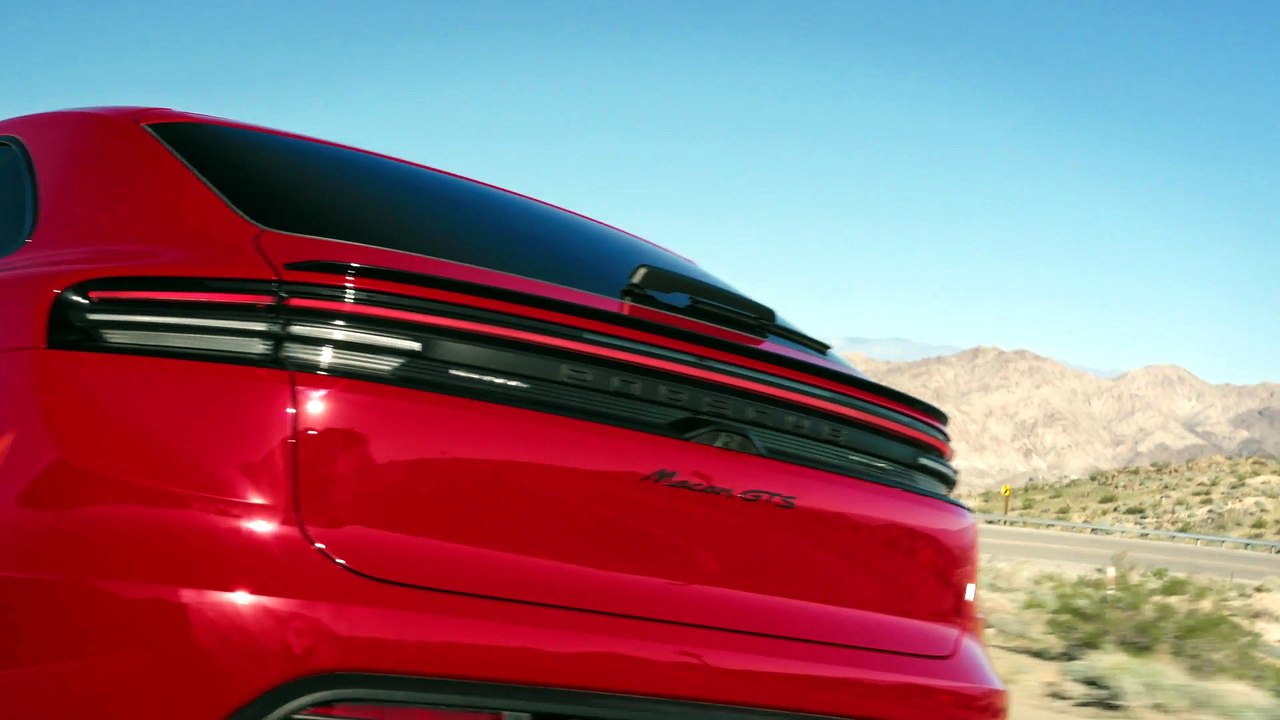 2026 Porsche Macan GTS in Carmine Red on the road
