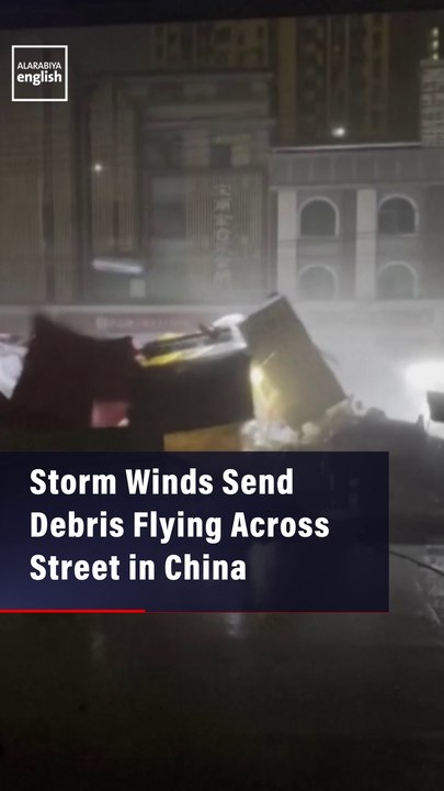 Storm Winds Send Debris Flying Across Street in China