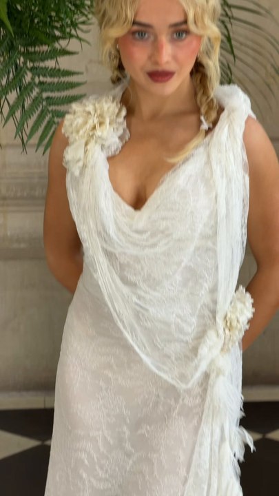 Sabrina Carpenter Stuns in White Lace at Paris Couture Week
